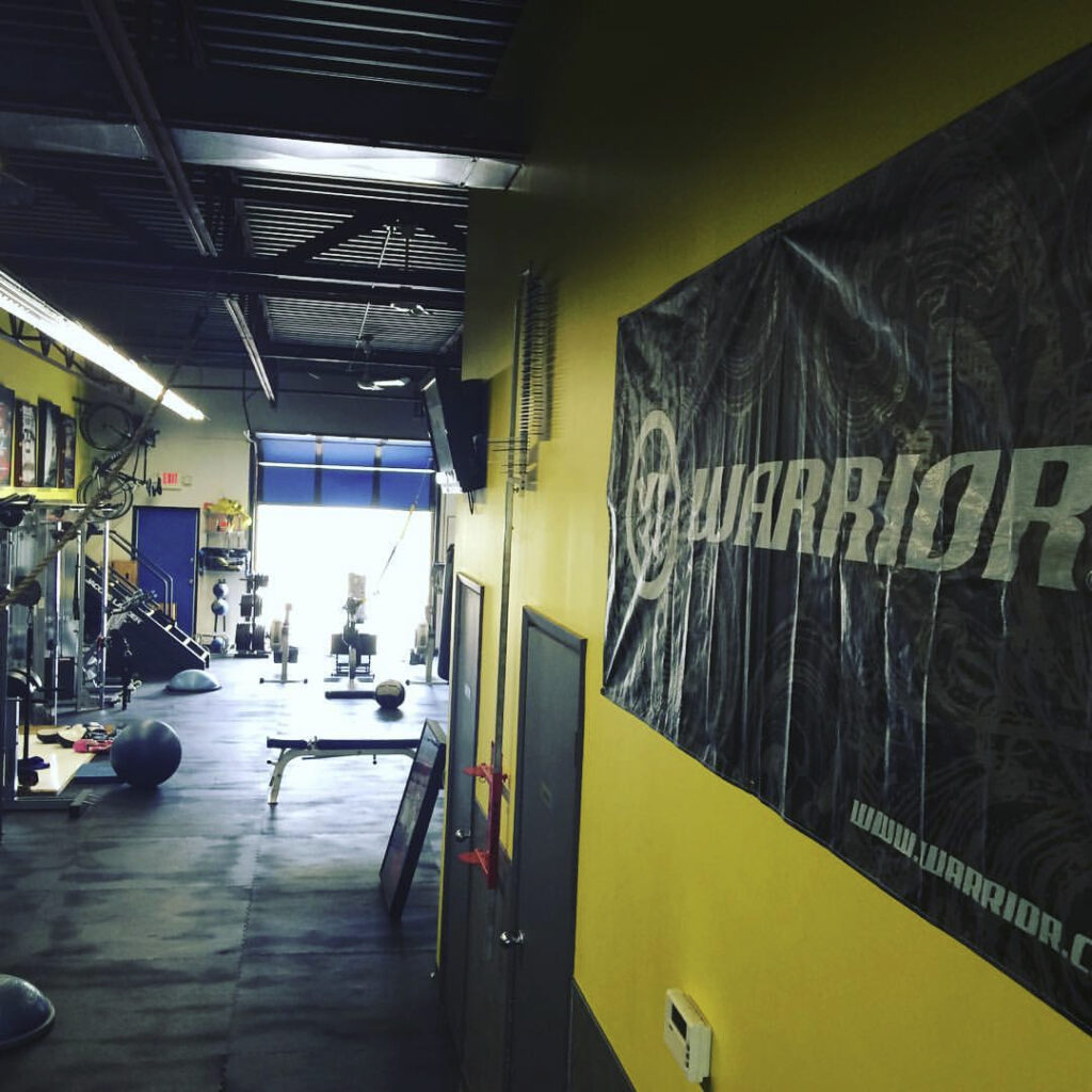 Richard burr fitness personal trainer winnipeg gym interior workout equipment warrior banner 126d8594 d661 422c af6e 297eb8f628a7